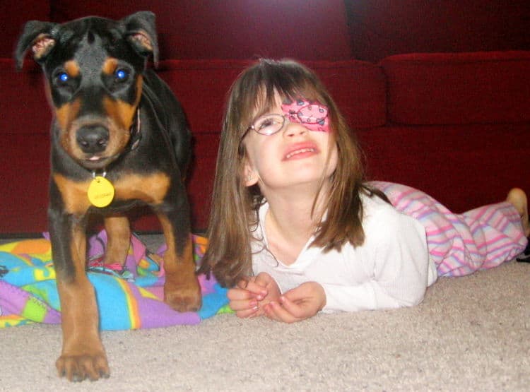 black male dobe pup home with children