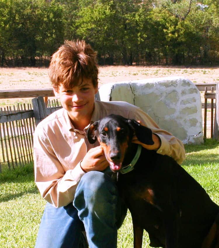 Buster family with Dobermans