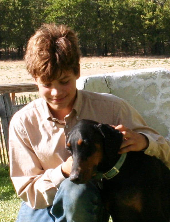 Buster family with Dobermans